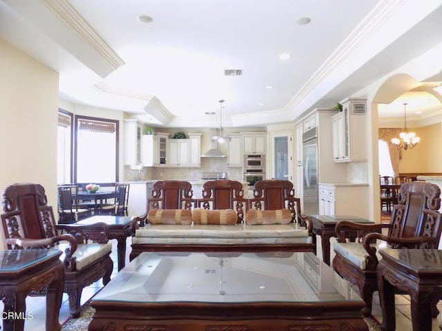4526 Katherine Ave, Sherman Oaks, CA 91423 - dining room featuring a tray ceiling, crown molding, arched walkways, and a chandelier