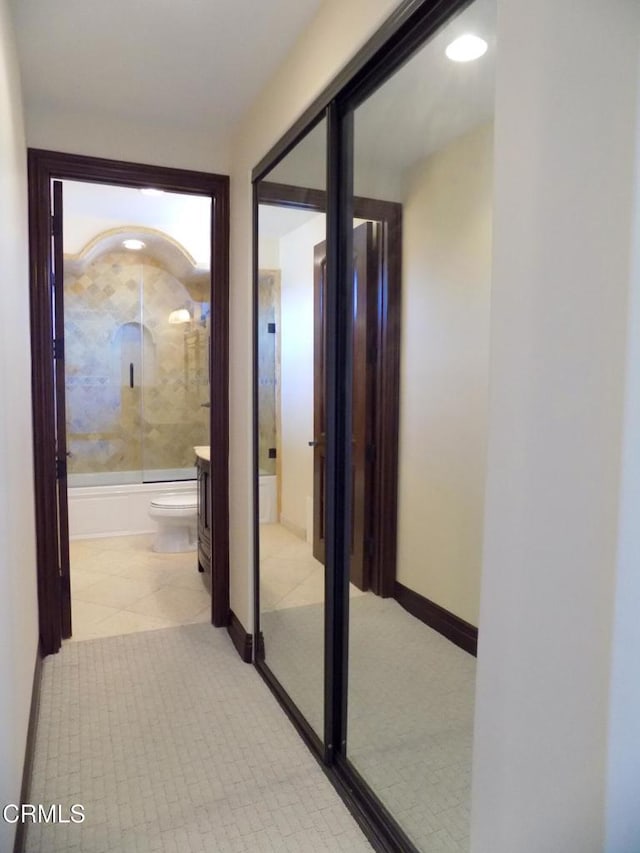 4526 Katherine Ave, Sherman Oaks, CA 91423 - hall with baseboards and light tile patterned floors