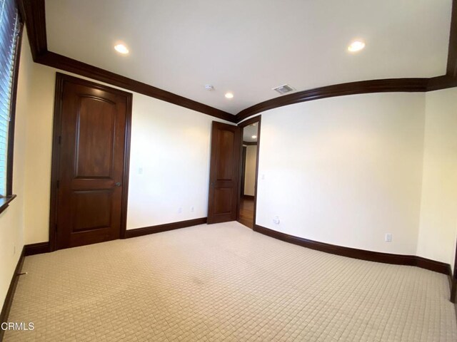 4526 Katherine Ave, Sherman Oaks, CA 91423 - empty room featuring crown molding, carpet, and recessed lighting