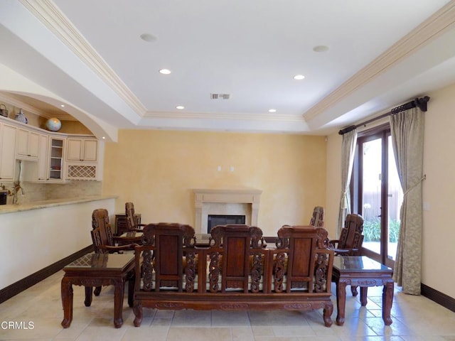 4526 Katherine Ave, Sherman Oaks, CA 91423 - dining area with a tray ceiling, ornamental molding, recessed lighting, a high end fireplace, and light tile patterned floors