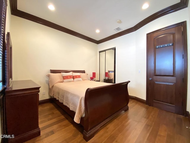 4526 Katherine Ave, Sherman Oaks, CA 91423 - bedroom with wood finished floors, ornamental molding, a closet, and recessed lighting