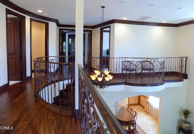 4526 Katherine Ave, Sherman Oaks, CA 91423 - staircase featuring ornamental molding, wood finished floors, a chandelier, and recessed lighting