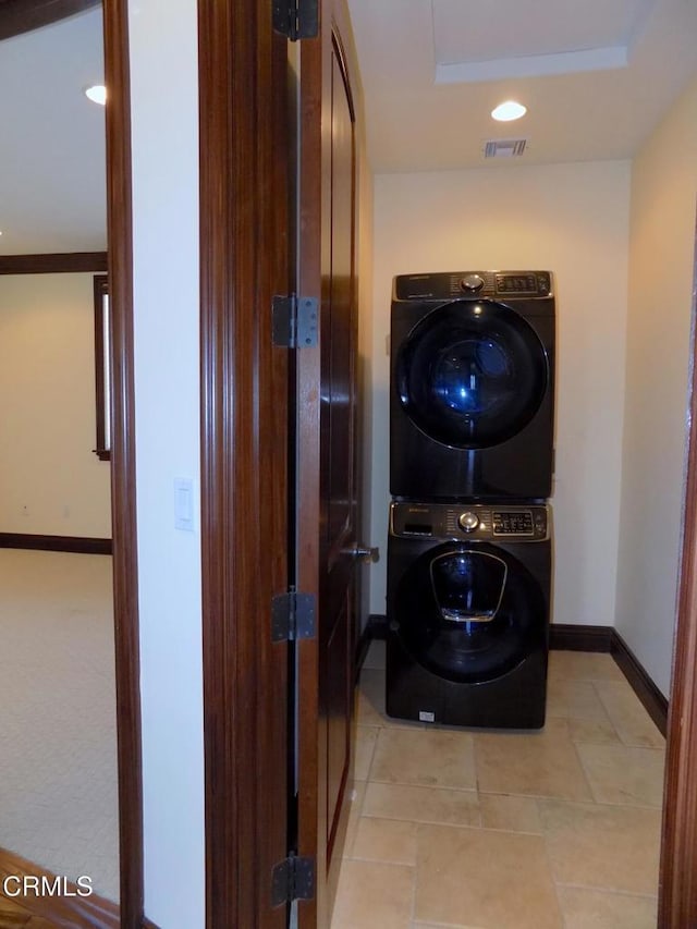4526 Katherine Ave, Sherman Oaks, CA 91423 - washroom with stacked washer / dryer and recessed lighting