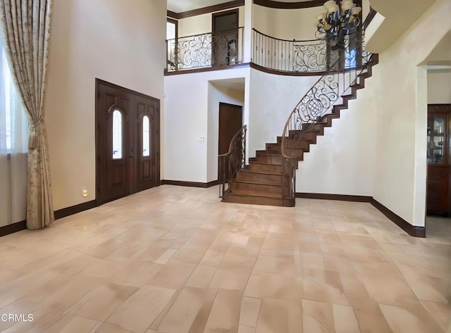 4526 Katherine Ave, Sherman Oaks, CA 91423 - entryway featuring stairs, a towering ceiling, and a chandelier