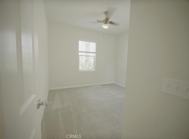 25382 Rocking Horse Ct, Menifee, CA 92584 - carpeted spare room featuring baseboards and ceiling fan