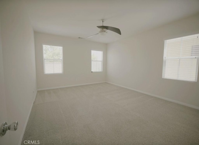 25382 Rocking Horse Ct, Menifee, CA 92584 - unfurnished room featuring light carpet and a ceiling fan