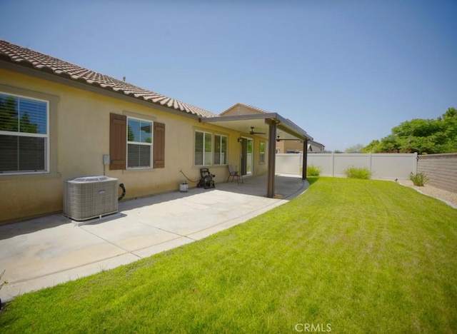 25382 Rocking Horse Ct, Menifee, CA 92584 - rear view of property featuring a ceiling fan, stucco siding, a patio, and a tiled roof
