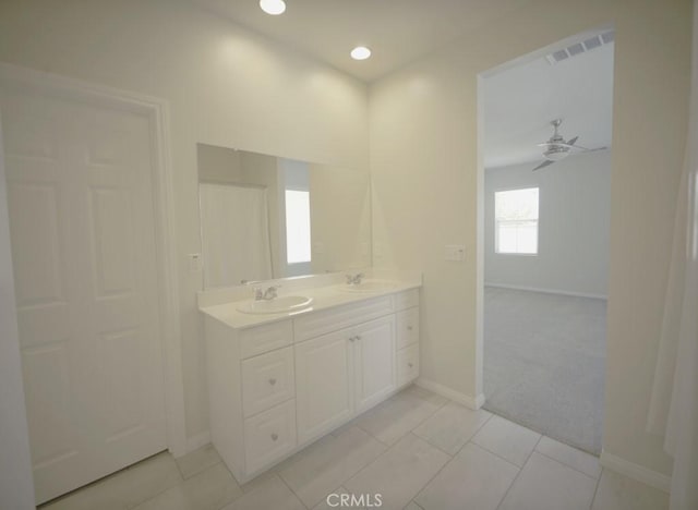 25382 Rocking Horse Ct, Menifee, CA 92584 - bathroom featuring double vanity, ceiling fan, tile patterned floors, and recessed lighting