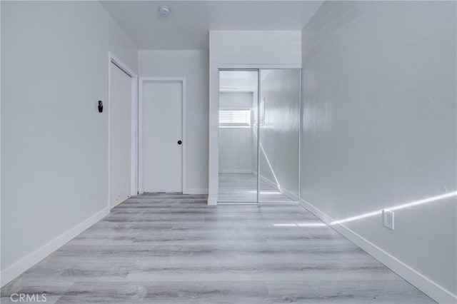 3731 Glendon Ave Unit 1, Los Angeles, CA 90034 - hallway with baseboards and wood finished floors