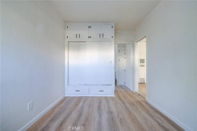 3731 Glendon Ave Unit 1, Los Angeles, CA 90034 - unfurnished bedroom featuring light wood finished floors and baseboards