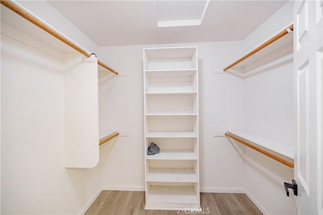 3807 Paula Ln, Lancaster, CA 93535 - spacious closet with wood finished floors