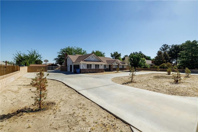 3807 Paula Ln, Lancaster, CA 93535 - view of front facade featuring concrete driveway