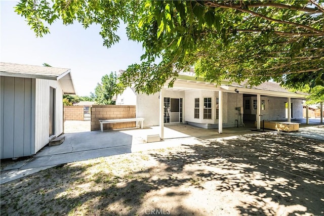 3807 Paula Ln, Lancaster, CA 93535 - rear view of house featuring a patio