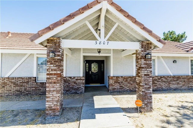 3807 Paula Ln, Lancaster, CA 93535 - property entrance with stucco siding and brick siding