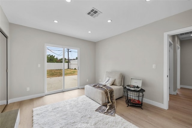 6820 Jellico Ave, Van Nuys, CA 91406 - bedroom with access to outside, light wood finished floors, and recessed lighting