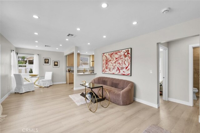 6820 Jellico Ave, Van Nuys, CA 91406 - living room with light wood finished floors and recessed lighting