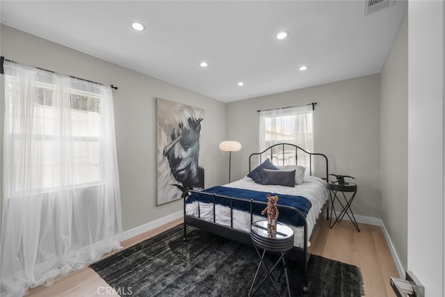 6820 Jellico Ave, Van Nuys, CA 91406 - bedroom featuring wood finished floors and recessed lighting
