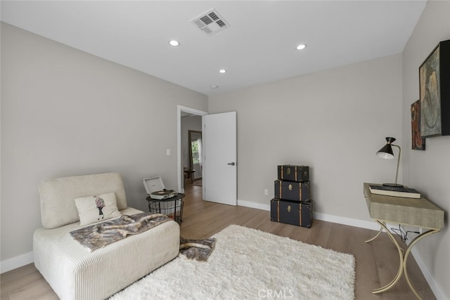 6820 Jellico Ave, Van Nuys, CA 91406 - living area featuring wood finished floors and recessed lighting