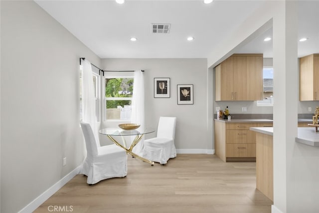 6820 Jellico Ave, Van Nuys, CA 91406 - dining area featuring light wood finished floors and recessed lighting