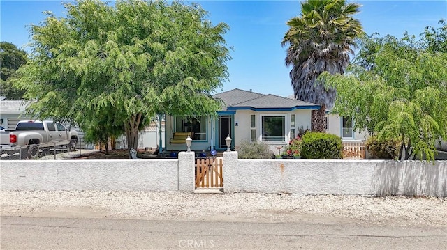 412 N Mallagh St, Nipomo, CA 93444 - view of front of house with a fenced front yard and stucco siding