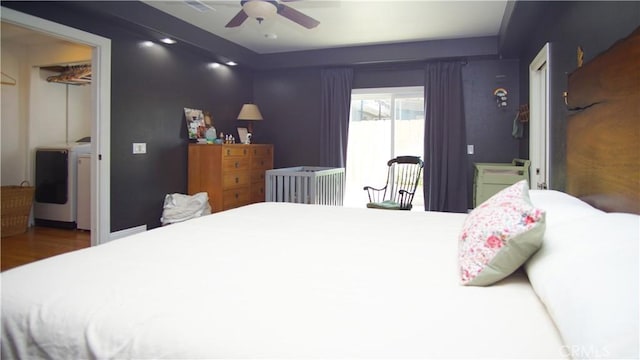 412 N Mallagh St, Nipomo, CA 93444 - bedroom featuring separate washer and dryer, access to exterior, wood finished floors, ceiling fan, and a spacious closet
