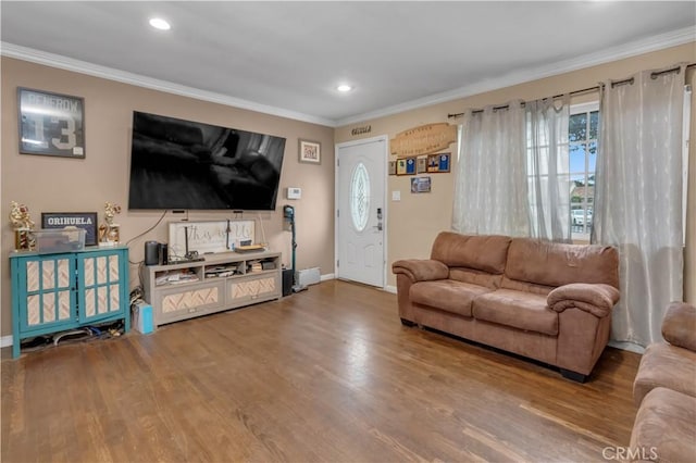 9430 Mines Ave, Pico Rivera, CA 90660 - living area featuring wood finished floors, crown molding, healthy amount of natural light, and recessed lighting