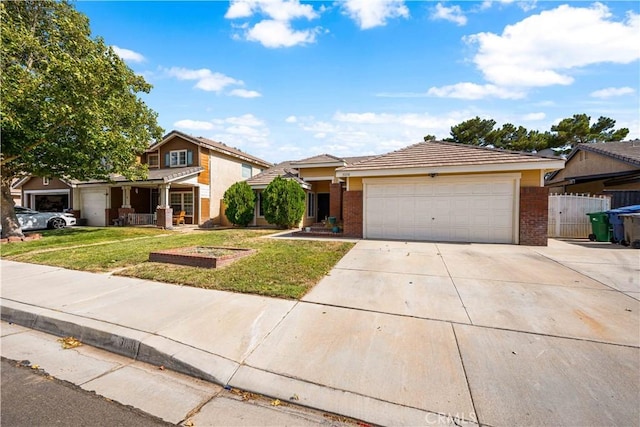 3038 Kaylyn St, Lancaster, CA 93535 - traditional home featuring brick siding, concrete driveway, and an attached garage