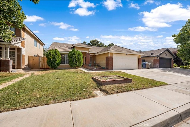 3038 Kaylyn St, Lancaster, CA 93535 - view of front of home featuring a garage, concrete driveway, and brick siding