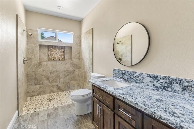 1021 Prince William Ct, Atwater, CA 95301 - full bathroom with vanity, a tile shower, and wood finished floors