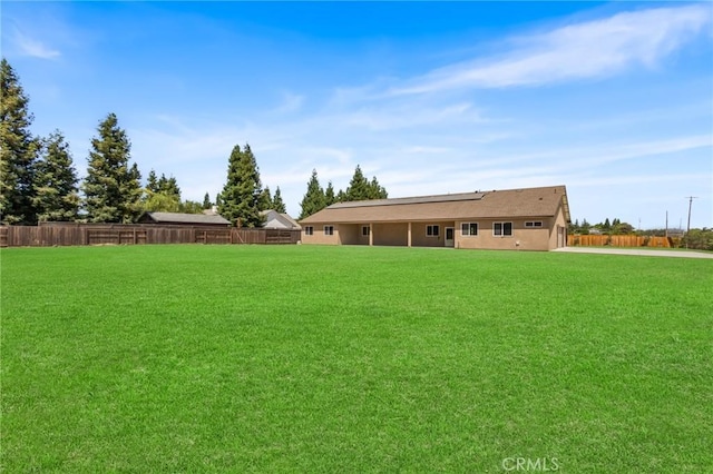 1021 Prince William Ct, Atwater, CA 95301 - back of house featuring concrete driveway and roof mounted solar panels