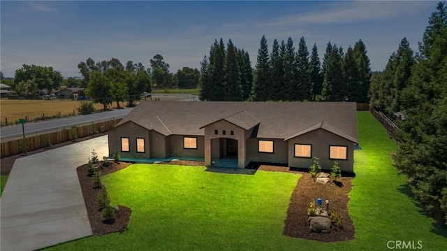 1021 Prince William Ct, Atwater, CA 95301 - single story home with concrete driveway, a front yard, and stucco siding