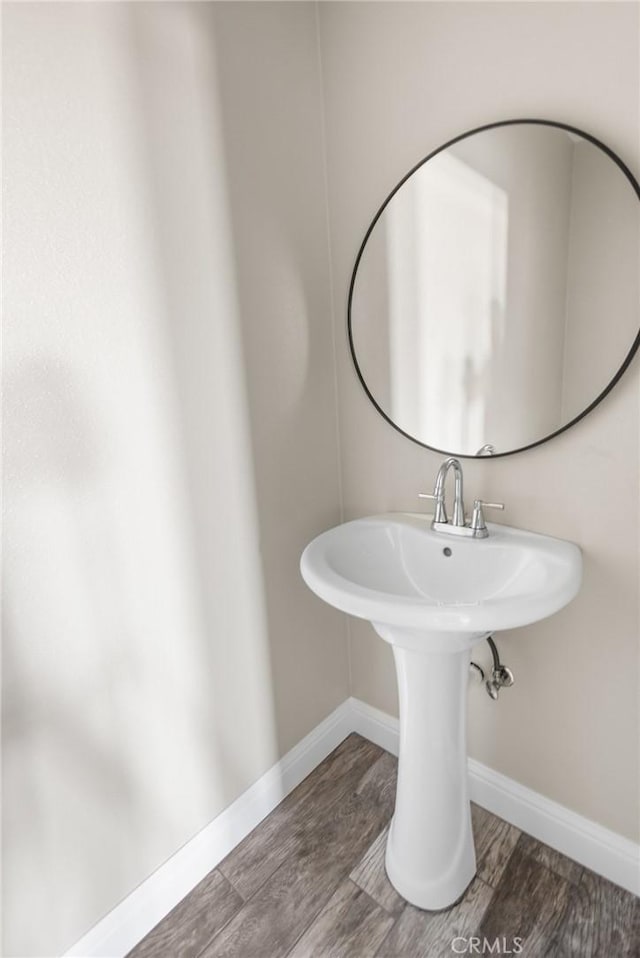 1021 Prince William Ct, Atwater, CA 95301 - bathroom with wood finished floors and baseboards