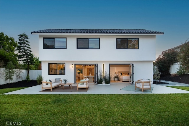 25302 Posada Ln, Mission Viejo, CA 92691 - back of property featuring an outdoor hangout area, stucco siding, and a patio area