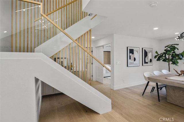 25302 Posada Ln, Mission Viejo, CA 92691 - staircase featuring wood finished floors and recessed lighting