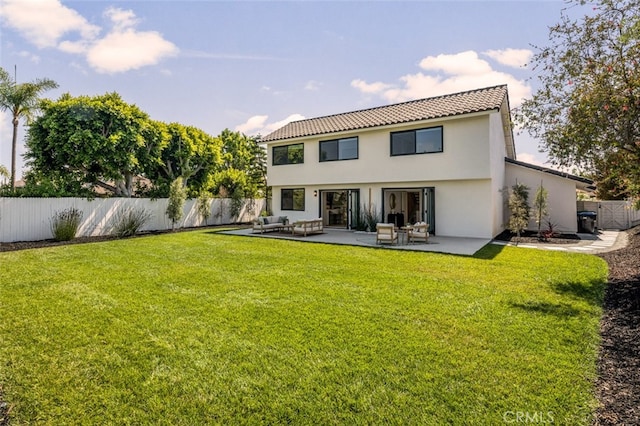 25302 Posada Ln, Mission Viejo, CA 92691 - rear view of house featuring stucco siding, a patio, outdoor lounge area, and a tiled roof