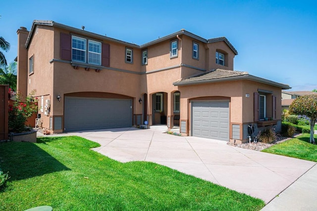5191 Cobalt Way, Oceanside, CA 92057 - mediterranean / spanish house with stucco siding, driveway, a garage, and a front yard