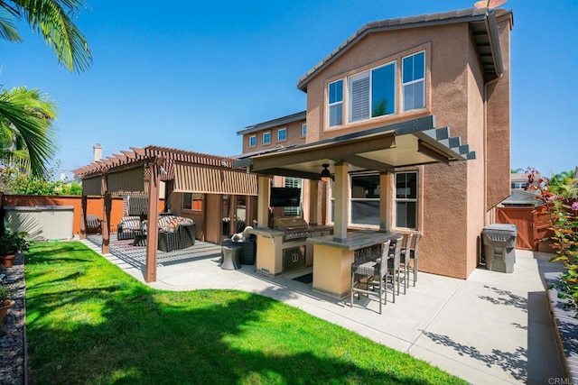 5191 Cobalt Way, Oceanside, CA 92057 - rear view of property featuring stucco siding, a pergola, and a patio area