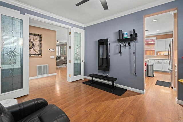 5191 Cobalt Way, Oceanside, CA 92057 - exercise area with a ceiling fan, light wood-type flooring, and crown molding