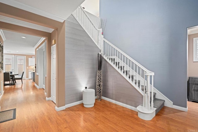 5191 Cobalt Way, Oceanside, CA 92057 - staircase featuring wood finished floors and ornamental molding