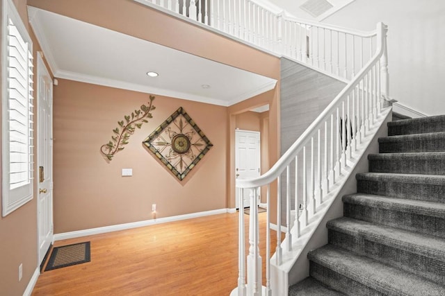 5191 Cobalt Way, Oceanside, CA 92057 - staircase with wood finished floors, crown molding, plenty of natural light, and recessed lighting