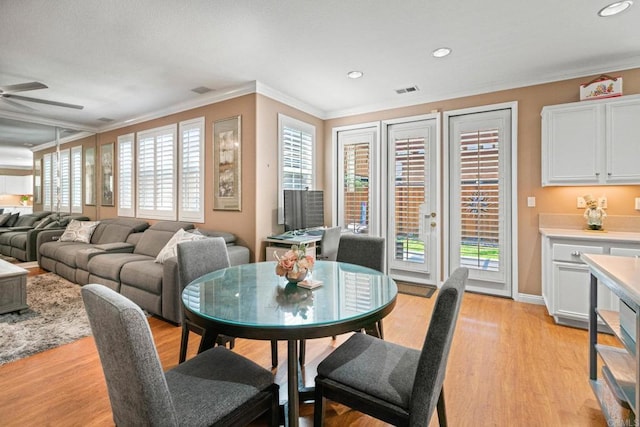 5191 Cobalt Way, Oceanside, CA 92057 - dining room with ornamental molding, light wood-style floors, recessed lighting, and a ceiling fan