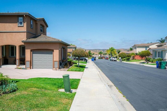 5191 Cobalt Way, Oceanside, CA 92057 - view of asphalt road with sidewalks, curbs, and a residential view