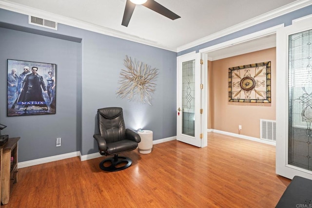 5191 Cobalt Way, Oceanside, CA 92057 - living area featuring wood finished floors, a ceiling fan, and ornamental molding