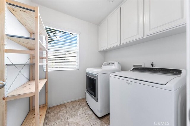 15216 Masline St, Baldwin Park, CA 91706 - laundry room featuring cabinet space, separate washer and dryer, and light tile patterned floors