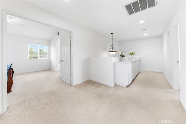 15216 Masline St, Baldwin Park, CA 91706 - corridor with light colored carpet, recessed lighting, and an upstairs landing