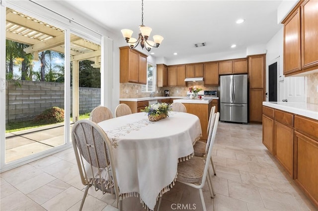 15216 Masline St, Baldwin Park, CA 91706 - dining space with a chandelier and recessed lighting