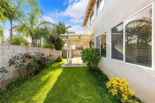 15216 Masline St, Baldwin Park, CA 91706 - fenced backyard with a patio area and a pergola