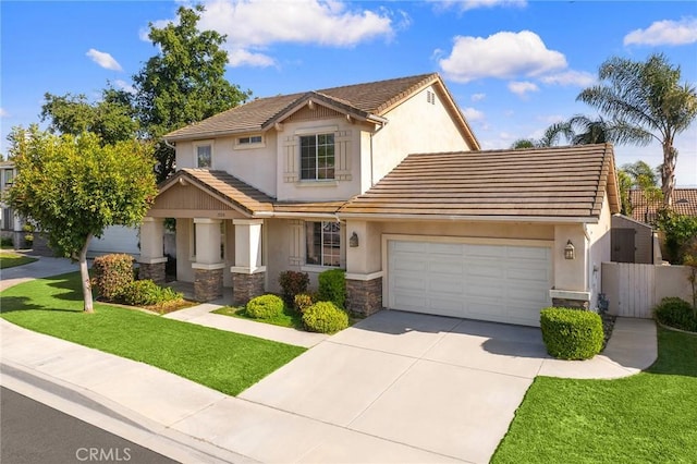 15216 Masline St, Baldwin Park, CA 91706 - view of front of home with stone siding, stucco siding, an attached garage, a tiled roof, and concrete driveway