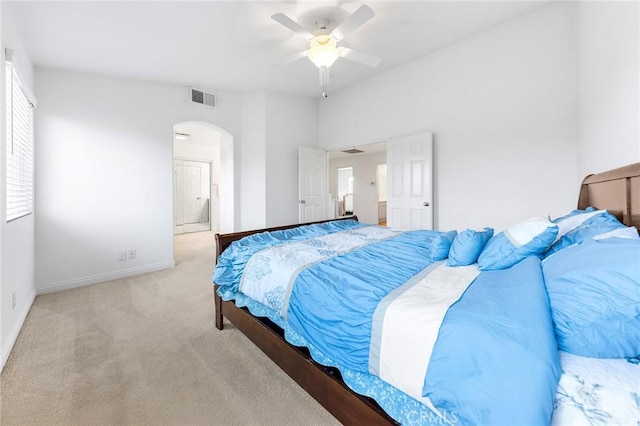 15216 Masline St, Baldwin Park, CA 91706 - carpeted bedroom featuring arched walkways and a ceiling fan
