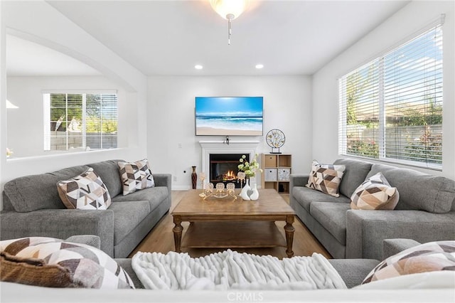 15216 Masline St, Baldwin Park, CA 91706 - living area with a glass covered fireplace, recessed lighting, and wood finished floors